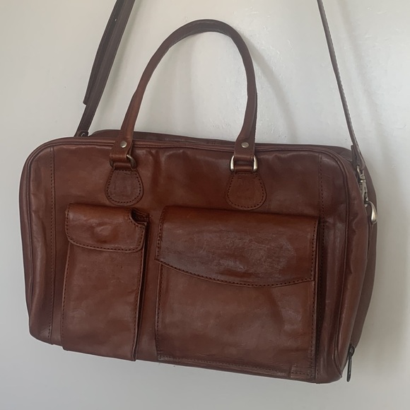 Leaders in leather bag size medium